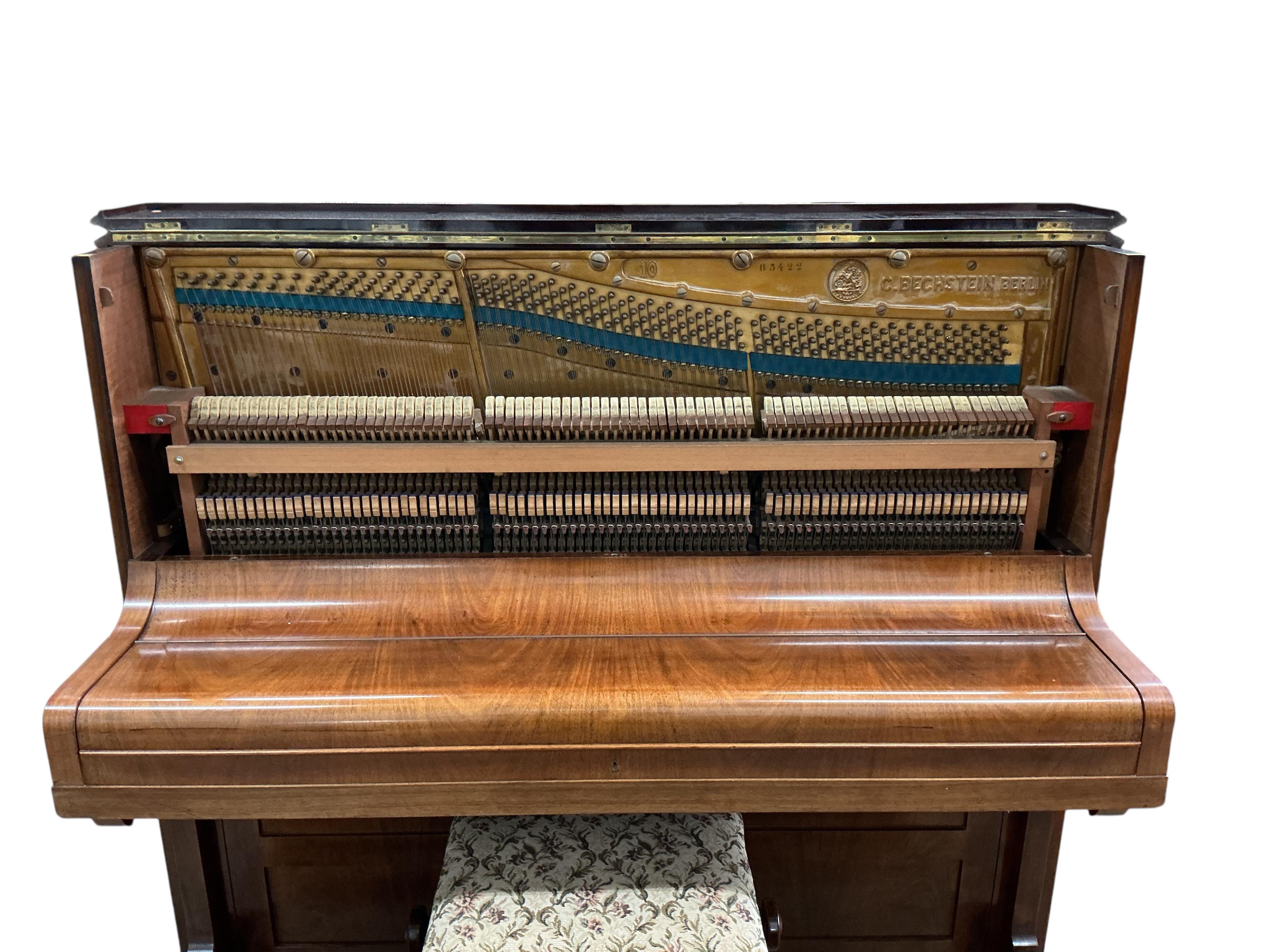An early 20th century Bechstein mahogany upright piano, width 157cm, depth 60cm, height 129cm CITES Submission reference MD5BYGPG